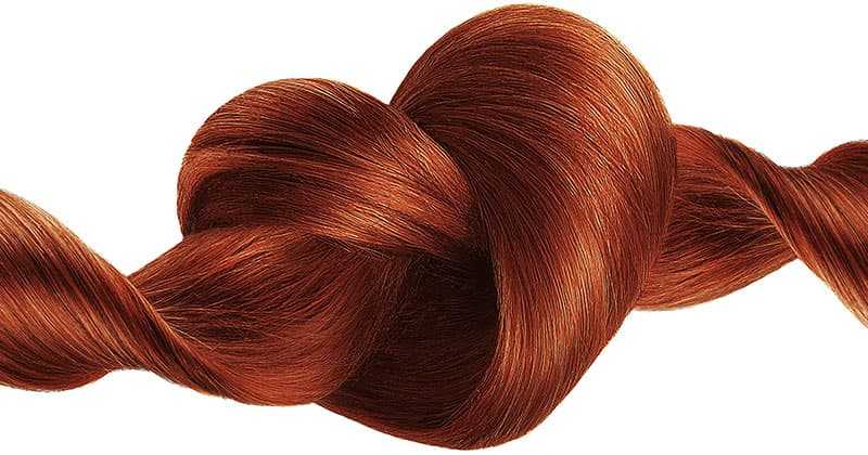 Healthy brown hair shaped like a heart shimmering in the sun