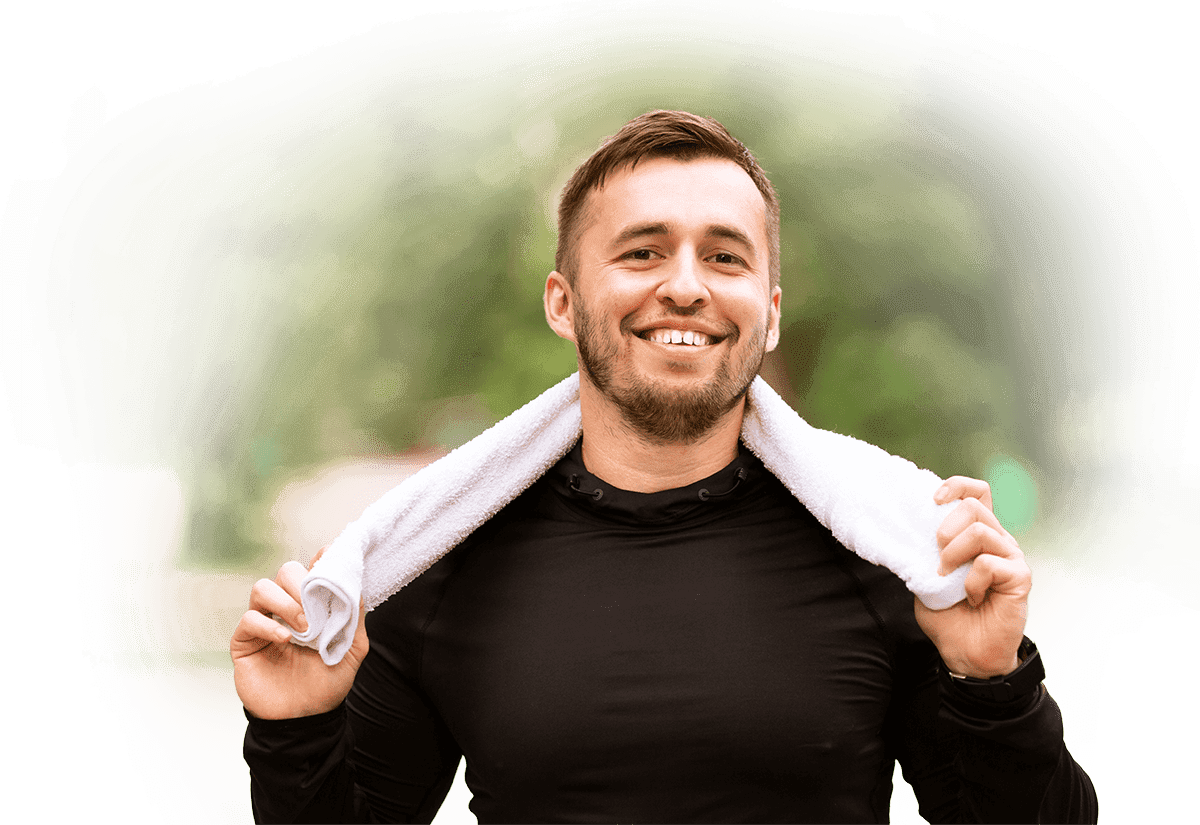 Active man smiling after workout